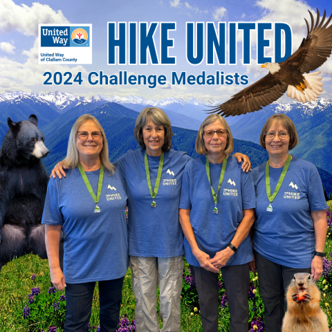 Four women in blue shirts