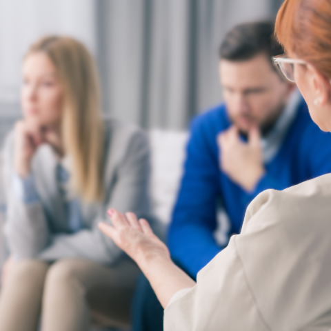 two people in a therapy session