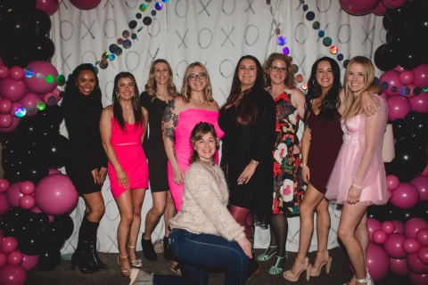 Large group of women posing for the camera