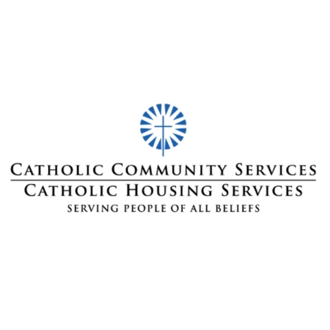 Sunburst with cross and reading catholic community services